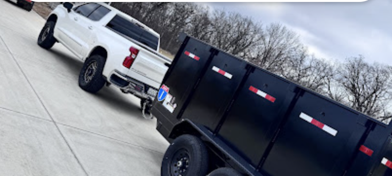 MLG Disposal Solutions truck and trailer loaded up for a junk haul